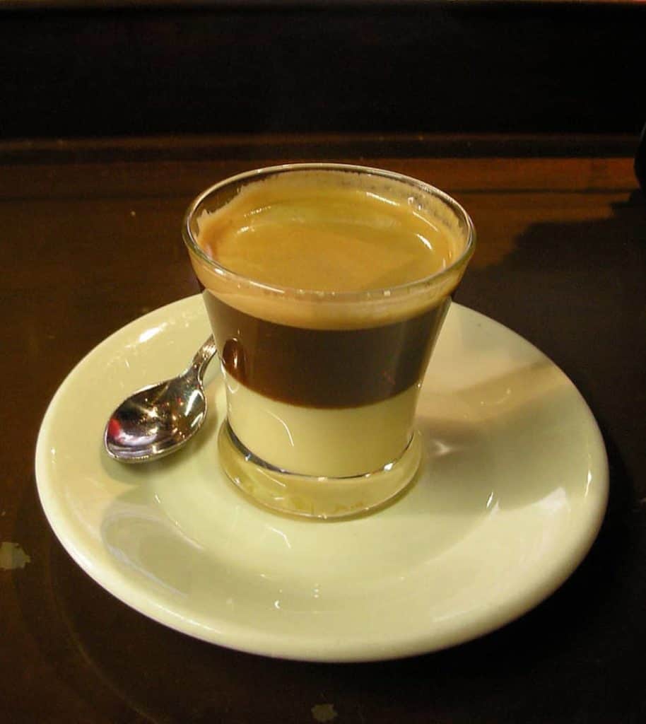 café bombón on a saucer with teaspoon