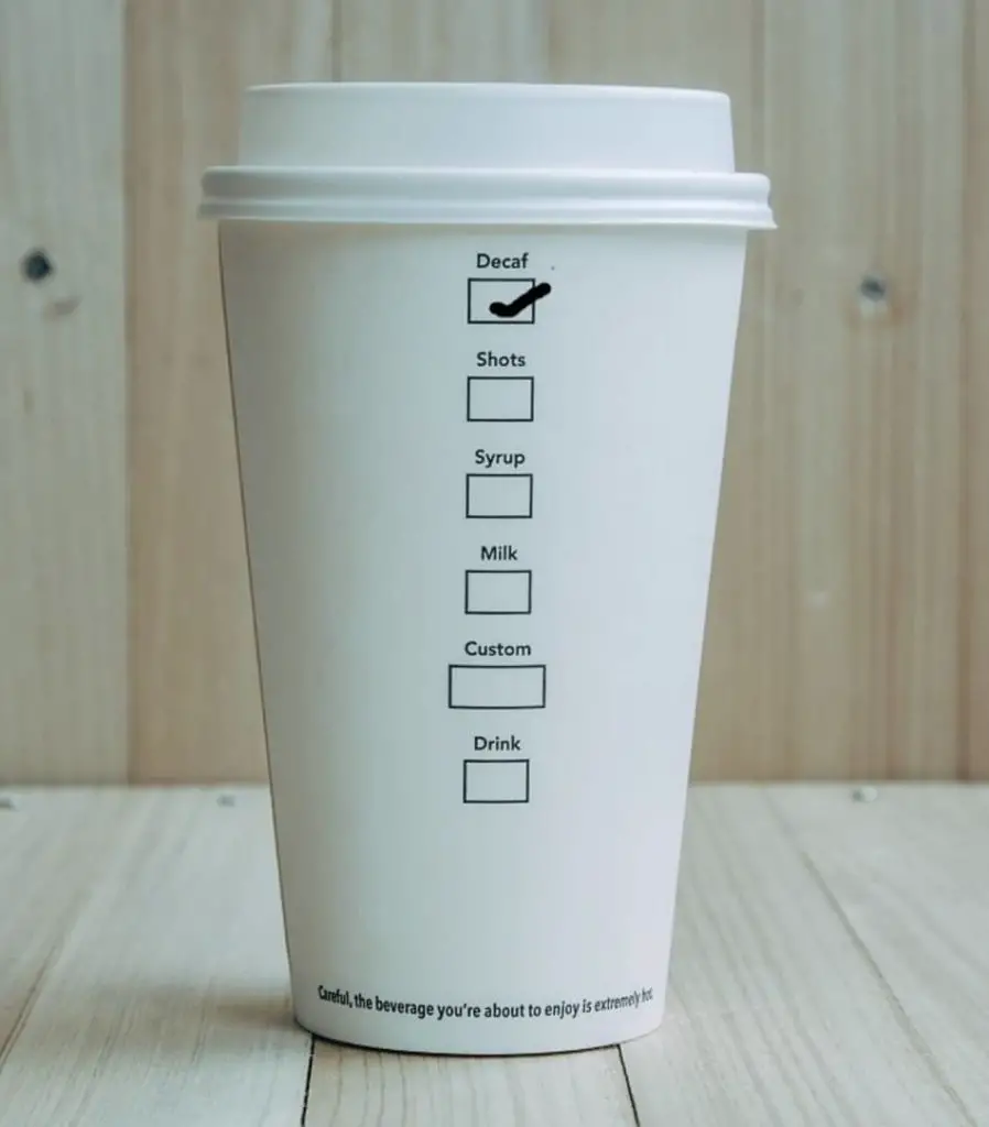 take away coffee cup of decaffeinated coffee