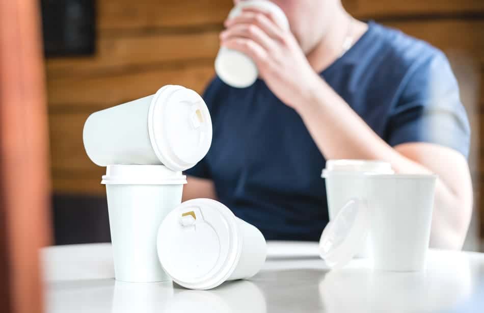 Man drinking lots of coffees