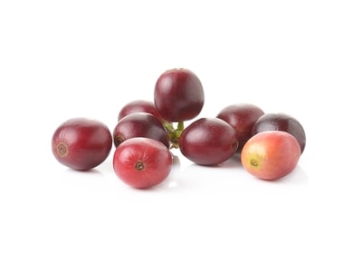 nine red coffee cherries on white background