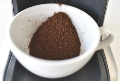 coffee grounds in white cup